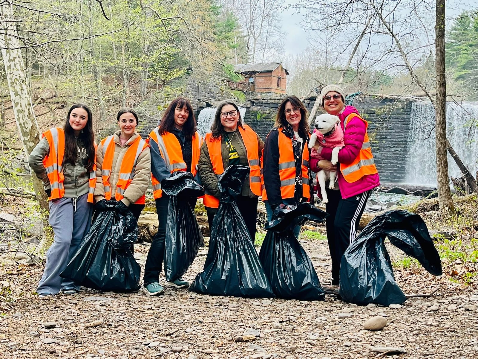Meghann Reimondo with volunteers at a Woodstock community cleanup day